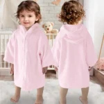 Baby pink hooded towel robe for babies 0-24 months with bear ears on the hood, front and back view