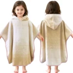 Front and back view of a toddler wearing a beige ombre gradient hooded cotton towel poncho.