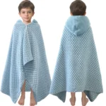 Front and back view of boys wearing blue dot wearable hooded cotton towel poncho
