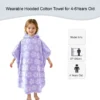 Aqua purple striped wearable hooded cotton towel shown on a child aged 4-6