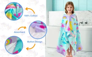 Mermaid Hooded Towel Beach Scene Girl in mermaid hooded poncho towel at beach, wearable kids pool towel outdoor photo