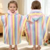 Front and back view of a colorful rainbow stripe toddler hooded towel