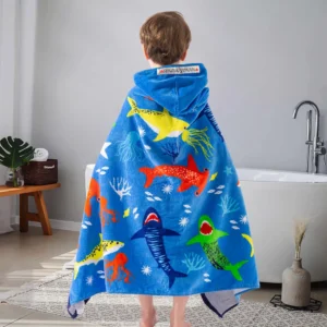 Shark Kids Wearable Towel Child wearing a blue shark wearable beach towel